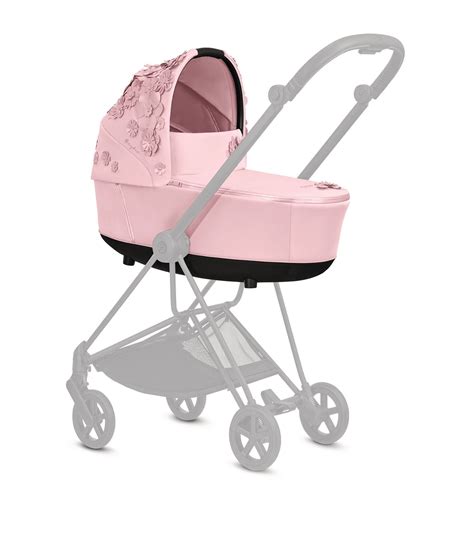 harrods baby pink cot.